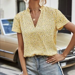 Yellow floral blouse